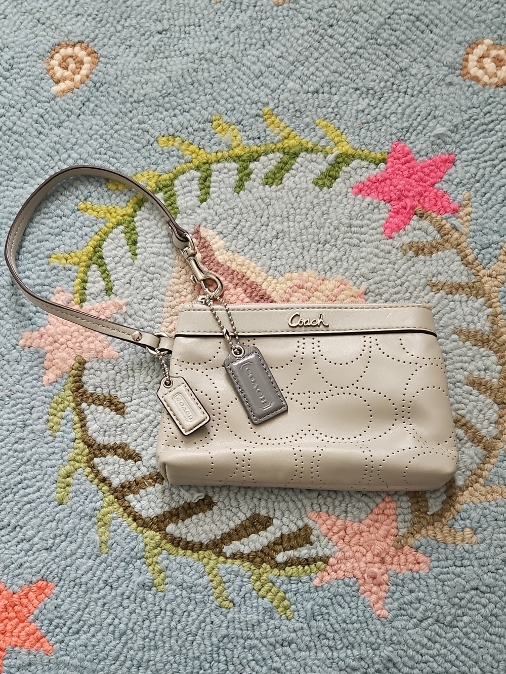 Coach Perforated Leather Wristlet in Light Beige